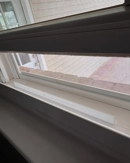 The same window track after cleaning by Katy Home Improvement