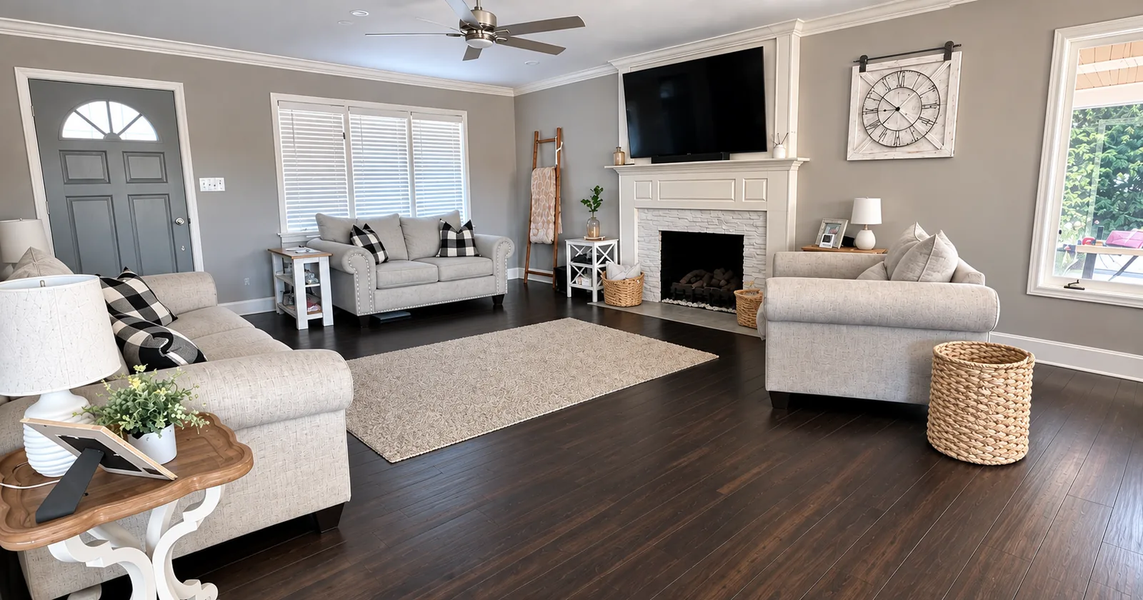 The same living room after cleaning by Katy Home Improvement: floors clear, rug straightened, surfaces tidy
